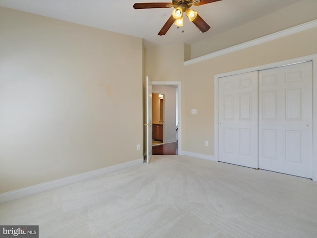 7730 Terraview Ct, Hanover, MD 21076 - unfurnished bedroom featuring light carpet, a closet, and ceiling fan
