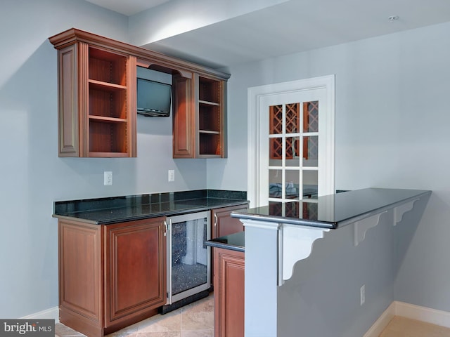7730 Terraview Ct, Hanover, MD 21076 - kitchen featuring open shelves, beverage cooler, a peninsula, and a breakfast bar area
