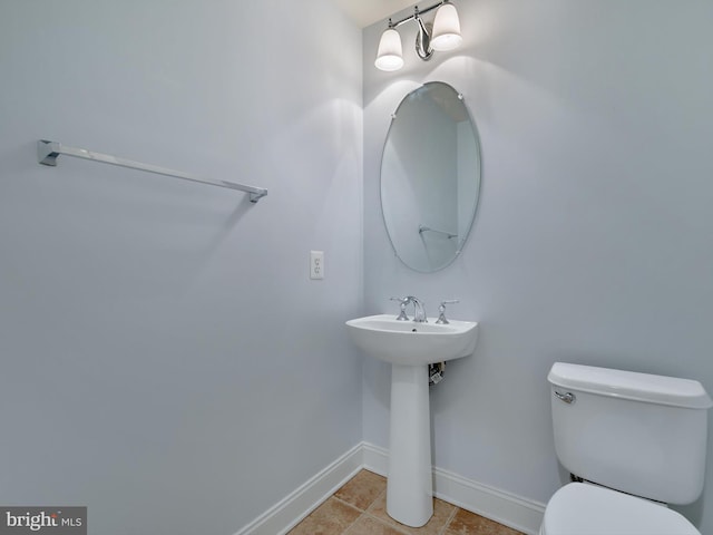 7730 Terraview Ct, Hanover, MD 21076 - half bathroom with toilet and tile patterned flooring