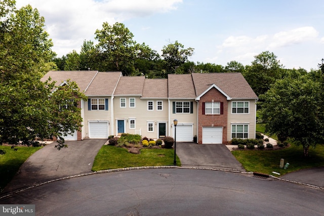 202 Park Knl, Princeton, NJ 08540 - view of front facade featuring driveway, an attached garage, and a front lawn