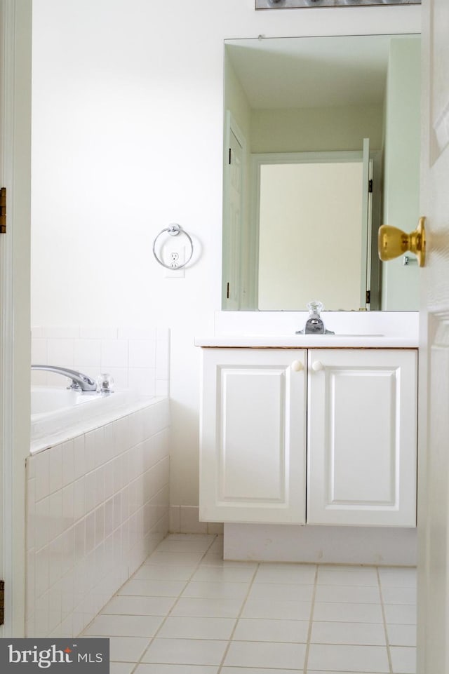 202 Park Knl, Princeton, NJ 08540 - bathroom featuring tile patterned floors, a garden tub, and vanity