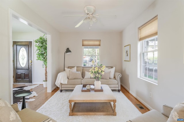 324 NW 8th St, Charlottesville, VA 22903 - living room featuring ceiling fan and light wood-style floors