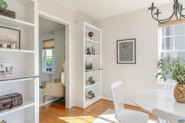 324 NW 8th St, Charlottesville, VA 22903 - dining space featuring a chandelier and light wood-type flooring