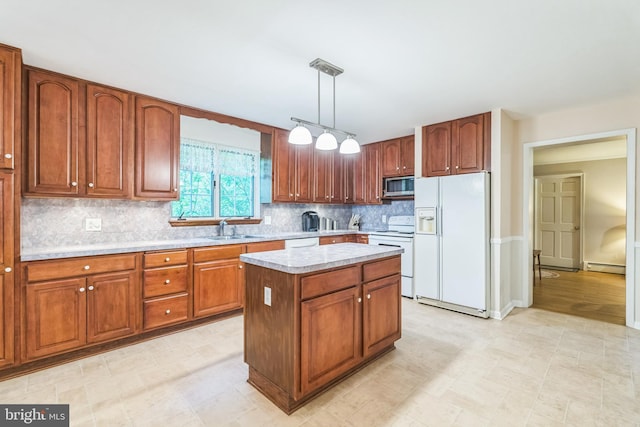 604 Big Oak Rd, Yardley, PA 19067 - kitchen with white appliances, light countertops, a baseboard radiator, tasteful backsplash, and pendant lighting