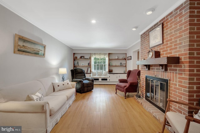 604 Big Oak Rd, Yardley, PA 19067 - living room with ornamental molding, a fireplace, light wood finished floors, baseboard heating, and recessed lighting