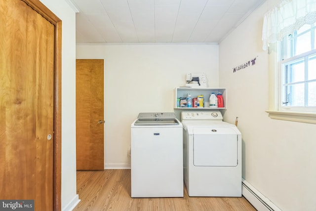 604 Big Oak Rd, Yardley, PA 19067 - laundry area featuring baseboard heating, washing machine and dryer, light wood-type flooring, and crown molding