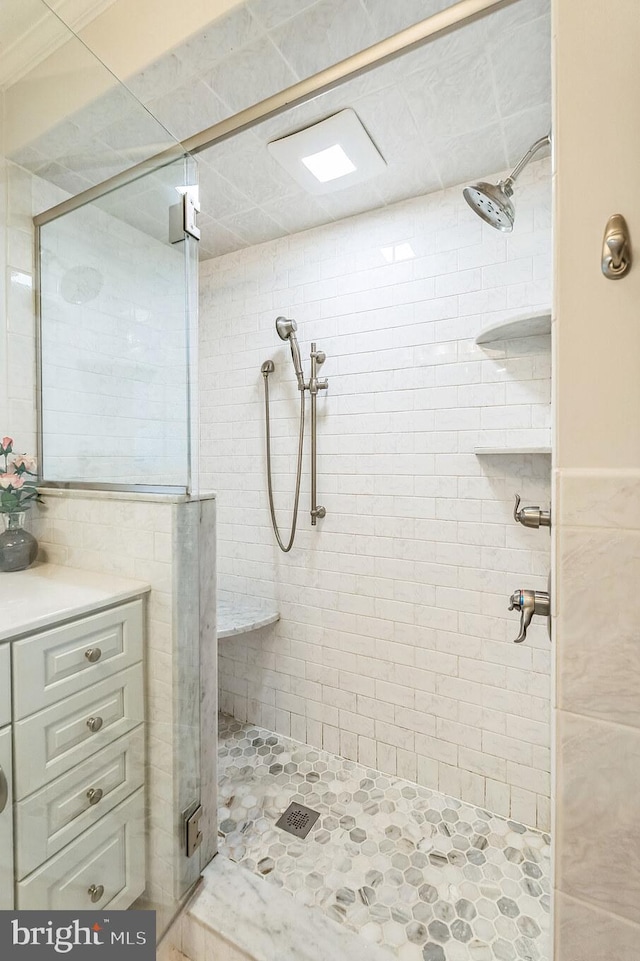 604 Big Oak Rd, Yardley, PA 19067 - full bath featuring a stall shower, tile walls, and vanity