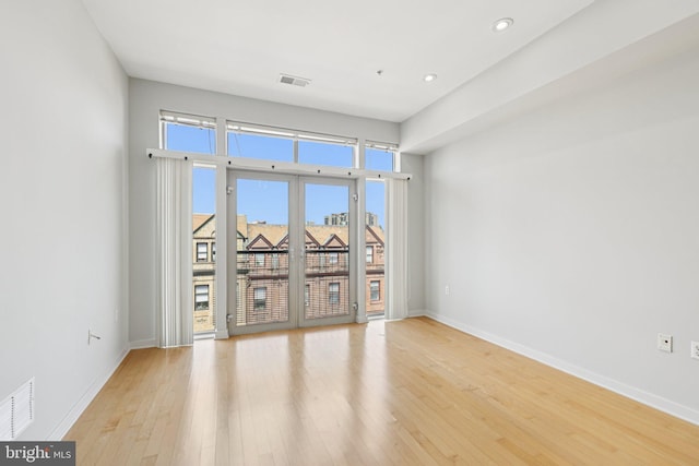 1209 N Charles St Unit 409, Baltimore, MD 21201 - unfurnished room with light wood finished floors and recessed lighting