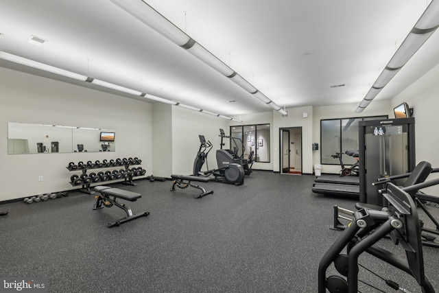 1209 N Charles St Unit 409, Baltimore, MD 21201 - workout area featuring baseboards