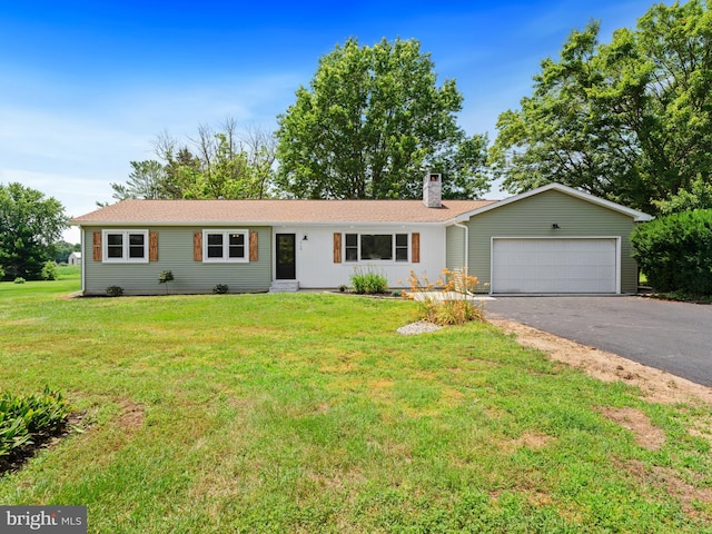 713 Franklinville Rd, Mullica Hill, NJ 08062 - single story home with a chimney, driveway, an attached garage, and a front lawn