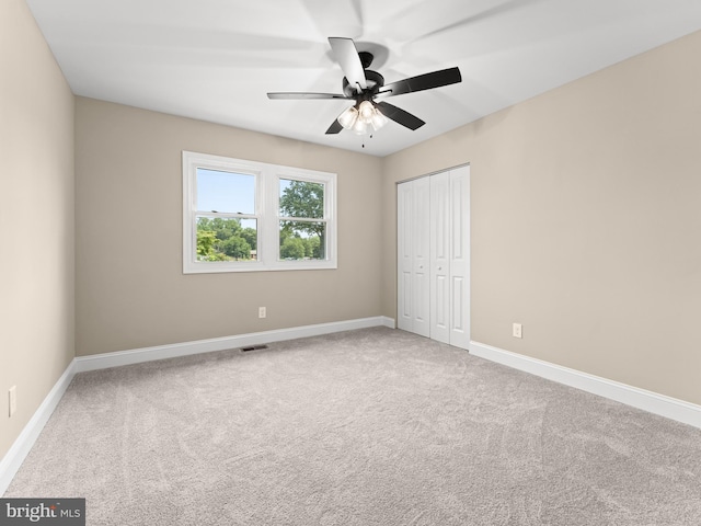 713 Franklinville Rd, Mullica Hill, NJ 08062 - unfurnished bedroom with carpet flooring, a closet, and a ceiling fan