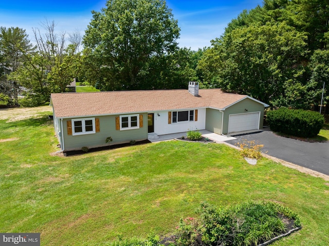 713 Franklinville Rd, Mullica Hill, NJ 08062 - single story home featuring a garage, driveway, a chimney, and a front lawn