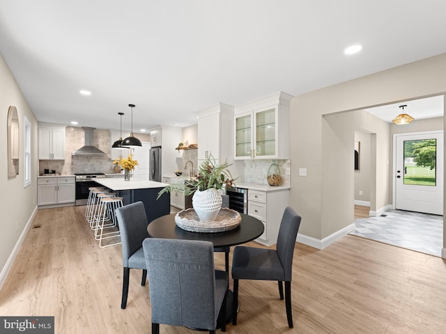 713 Franklinville Rd, Mullica Hill, NJ 08062 - dining room with light wood finished floors, recessed lighting, and beverage cooler