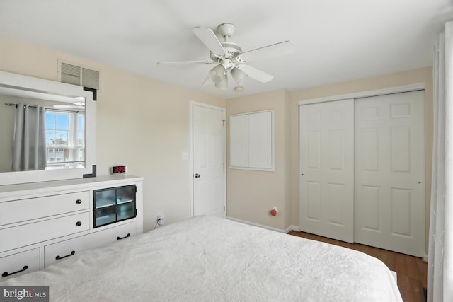 810 Regis Ct, Halethorpe, MD 21227 - bedroom featuring wood finished floors, a closet, and a ceiling fan