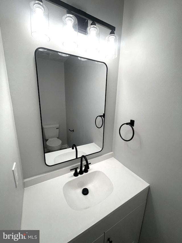 54 Liborio Ln, New Castle, DE 19720 - half bathroom featuring toilet and vanity