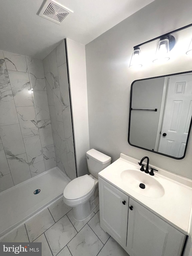 54 Liborio Ln, New Castle, DE 19720 - full bathroom featuring marble look tiles, vanity, and a stall shower
