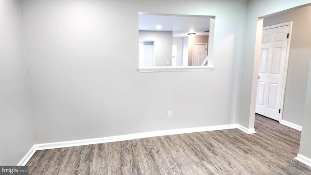 54 Liborio Ln, New Castle, DE 19720 - unfurnished room featuring wood finished floors and baseboards