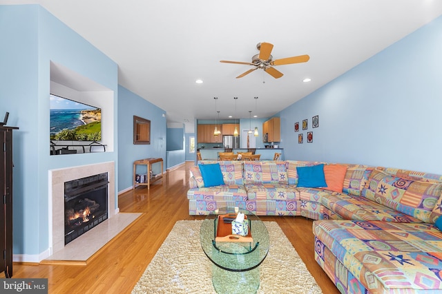 37166 Gull Watch Way Unit 1315, Selbyville, DE 19975 - living area featuring light wood-style floors, a ceiling fan, a fireplace, and recessed lighting
