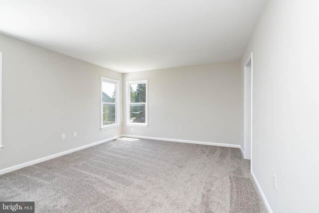 3 Beckett St, Clayton, NJ 08312 - carpeted spare room with baseboards