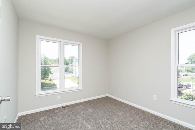 3 Beckett St, Clayton, NJ 08312 - carpeted spare room with healthy amount of natural light