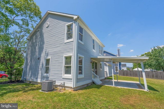 3 Beckett St, Clayton, NJ 08312 - rear view of property featuring entry steps, a carport, and a patio