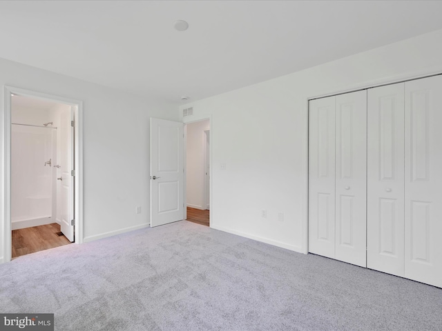 566 Monocacy Trl, Spring Grove, PA 17362 - unfurnished bedroom featuring carpet flooring, a closet, and connected bathroom