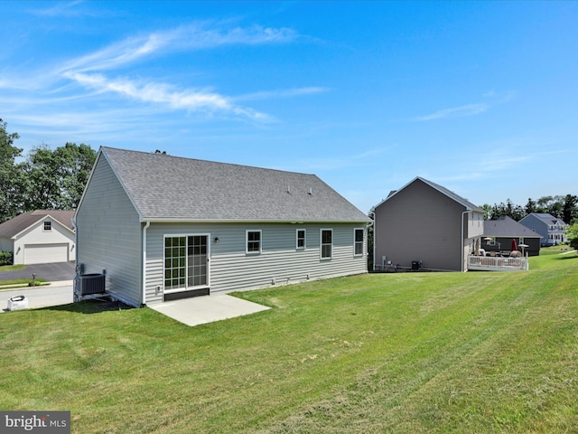 566 Monocacy Trl, Spring Grove, PA 17362 - rear view of house featuring a yard, a garage, and a patio