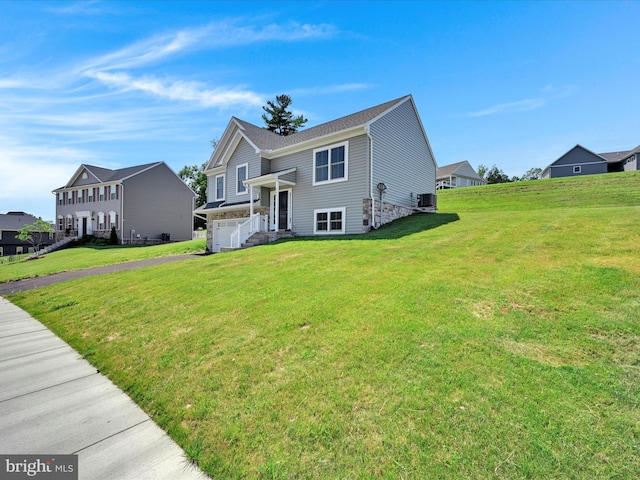 566 Monocacy Trl, Spring Grove, PA 17362 - view of front of house featuring a garage, driveway, and a front yard