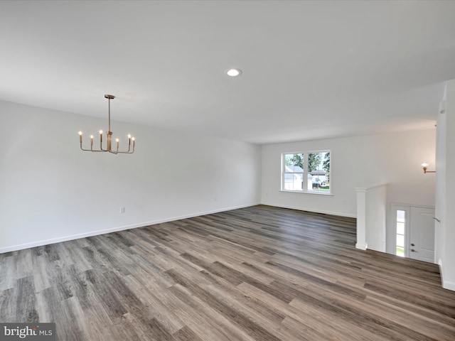 566 Monocacy Trl, Spring Grove, PA 17362 - unfurnished living room with a chandelier, wood finished floors, and recessed lighting