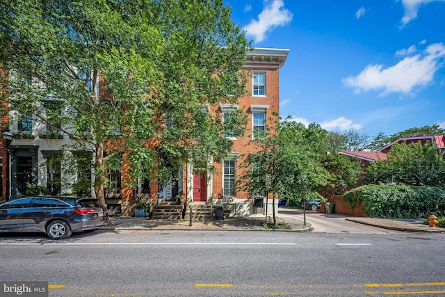 239 W Lafayette Ave, Baltimore, MD 21217 - view of property featuring brick siding