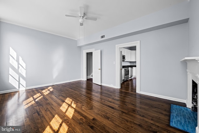 239 W Lafayette Ave, Baltimore, MD 21217 - unfurnished living room with a ceiling fan, dark wood-style floors, and a fireplace with flush hearth