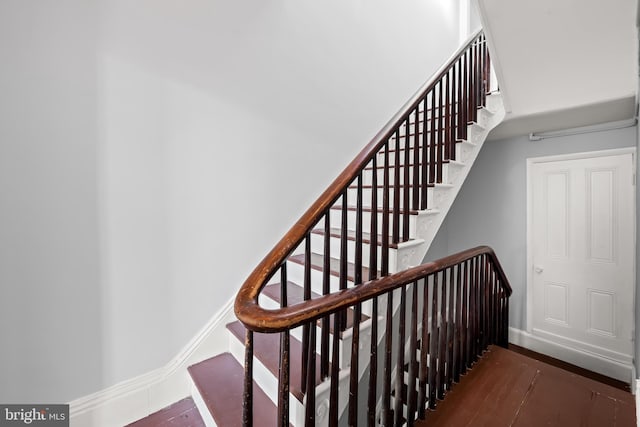 239 W Lafayette Ave, Baltimore, MD 21217 - staircase with wood finished floors and baseboards