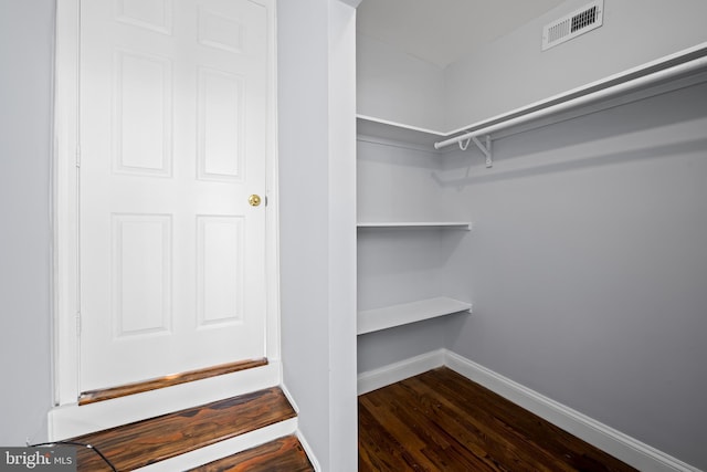 239 W Lafayette Ave, Baltimore, MD 21217 - spacious closet featuring dark wood-style flooring