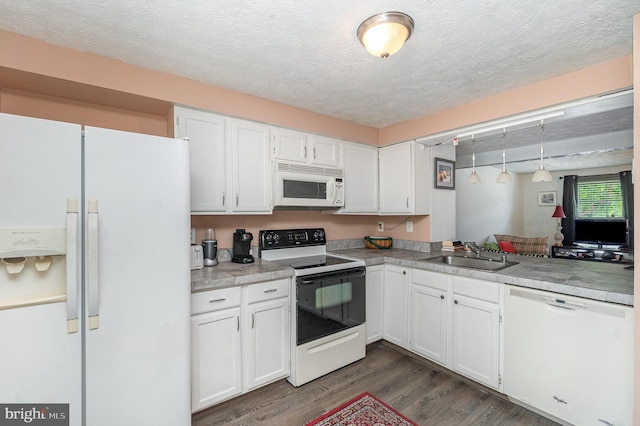 845 Angel Valley Ct, Edgewood, MD 21040 - kitchen with white appliances, dark wood finished floors, white cabinets, a textured ceiling, and light countertops