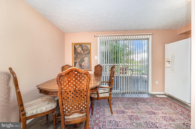 845 Angel Valley Ct, Edgewood, MD 21040 - dining room featuring a textured ceiling and wood finished floors