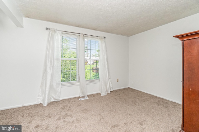 845 Angel Valley Ct, Edgewood, MD 21040 - carpeted spare room with a textured ceiling
