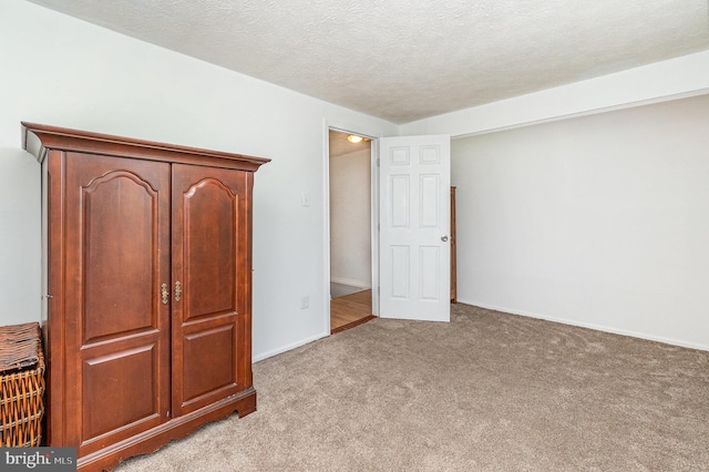 845 Angel Valley Ct, Edgewood, MD 21040 - unfurnished bedroom with light carpet and a textured ceiling
