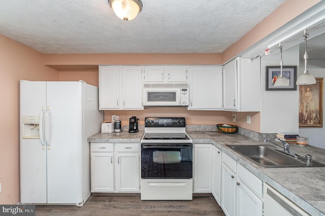 845 Angel Valley Ct, Edgewood, MD 21040 - kitchen featuring white appliances, white cabinets, dark wood-type flooring, a textured ceiling, and light countertops