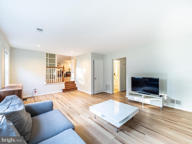 14901 Joshua Tree Rd, North Potomac, MD 20878 - living area with stairs, light wood finished floors, and recessed lighting