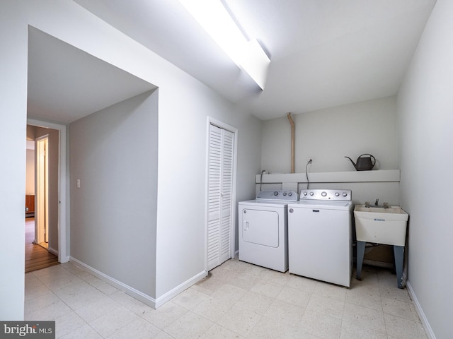 14901 Joshua Tree Rd, North Potomac, MD 20878 - laundry area with washer and dryer and baseboards