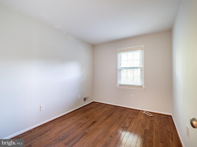 14901 Joshua Tree Rd, North Potomac, MD 20878 - empty room with wood finished floors and baseboards