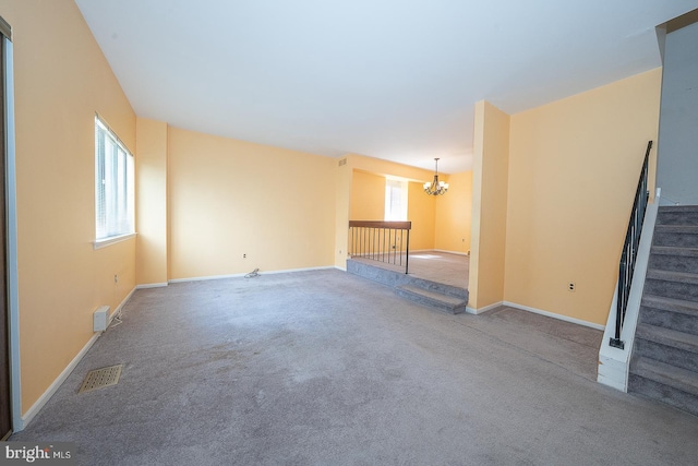 1368 Abbey Way, Bensalem, PA 19020 - unfurnished living room with a chandelier, carpet, and stairs