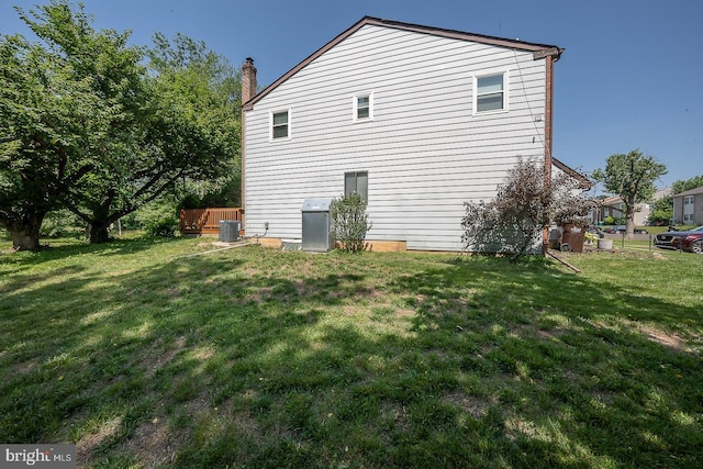 1368 Abbey Way, Bensalem, PA 19020 - view of side of home featuring a central AC unit and a chimney