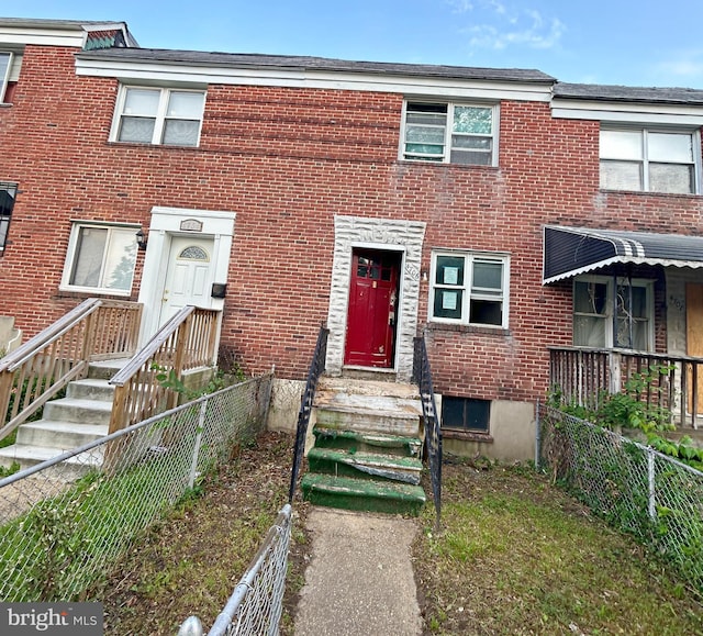 4706 Alhambra Ave, Baltimore, MD 21212 - view of property featuring a fenced backyard and brick siding