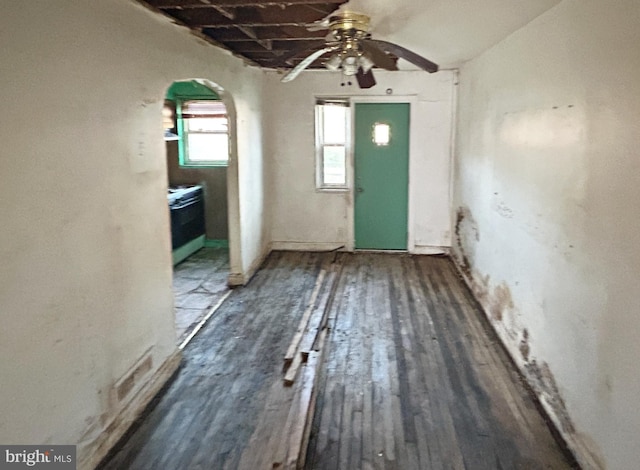 4706 Alhambra Ave, Baltimore, MD 21212 - entrance foyer featuring arched walkways, ceiling fan, and wood finished floors