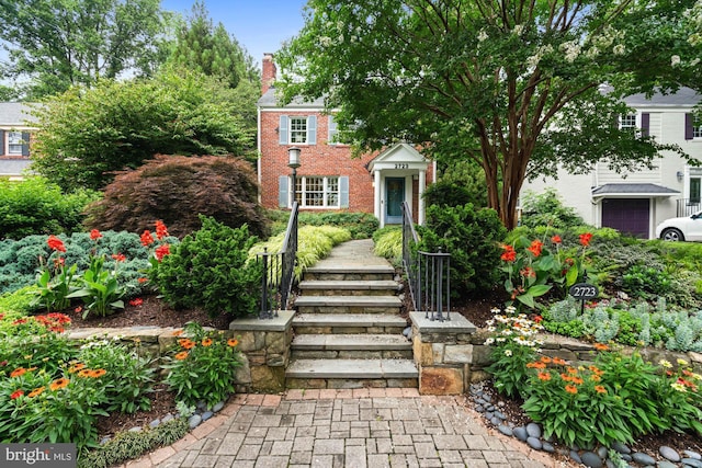 2723 Washington Ave, Chevy Chase, MD 20815 - colonial inspired home with a chimney and brick siding
