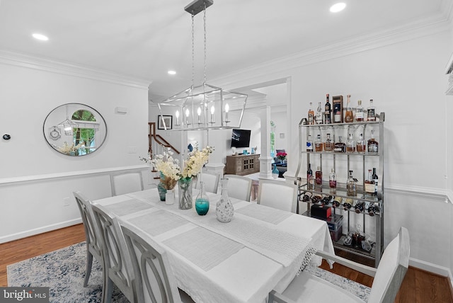 10111 Ballynahown Cir, Fairfax, VA 22030 - dining room with a chandelier, ornamental molding, wood finished floors, and recessed lighting