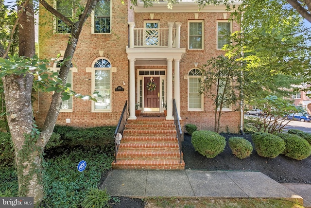 10111 Ballynahown Cir, Fairfax, VA 22030 - view of front of home featuring a balcony and brick siding