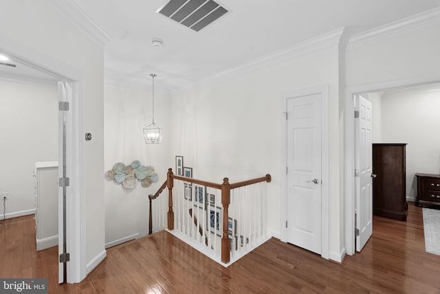 10111 Ballynahown Cir, Fairfax, VA 22030 - corridor featuring an upstairs landing, crown molding, wood finished floors, and a chandelier