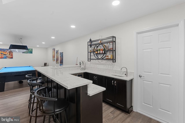 10111 Ballynahown Cir, Fairfax, VA 22030 - indoor wet bar with wood finished floors and recessed lighting